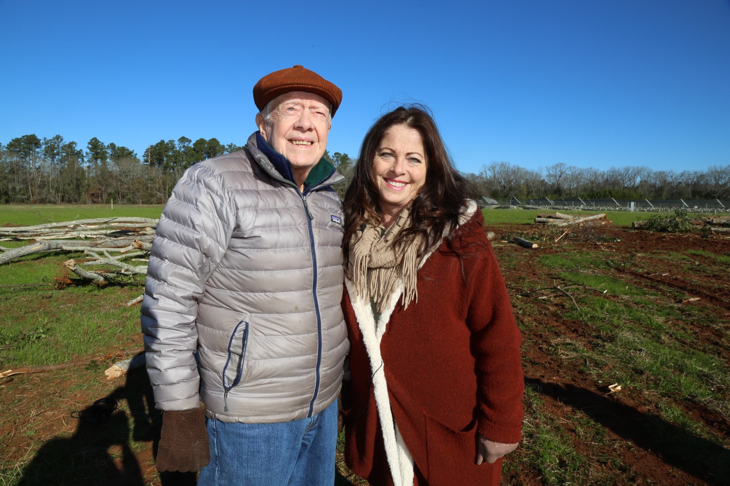 President Jimmy Carter and World Tree founder Wendy Burton at his paulownia harvest in Plains, Georgia